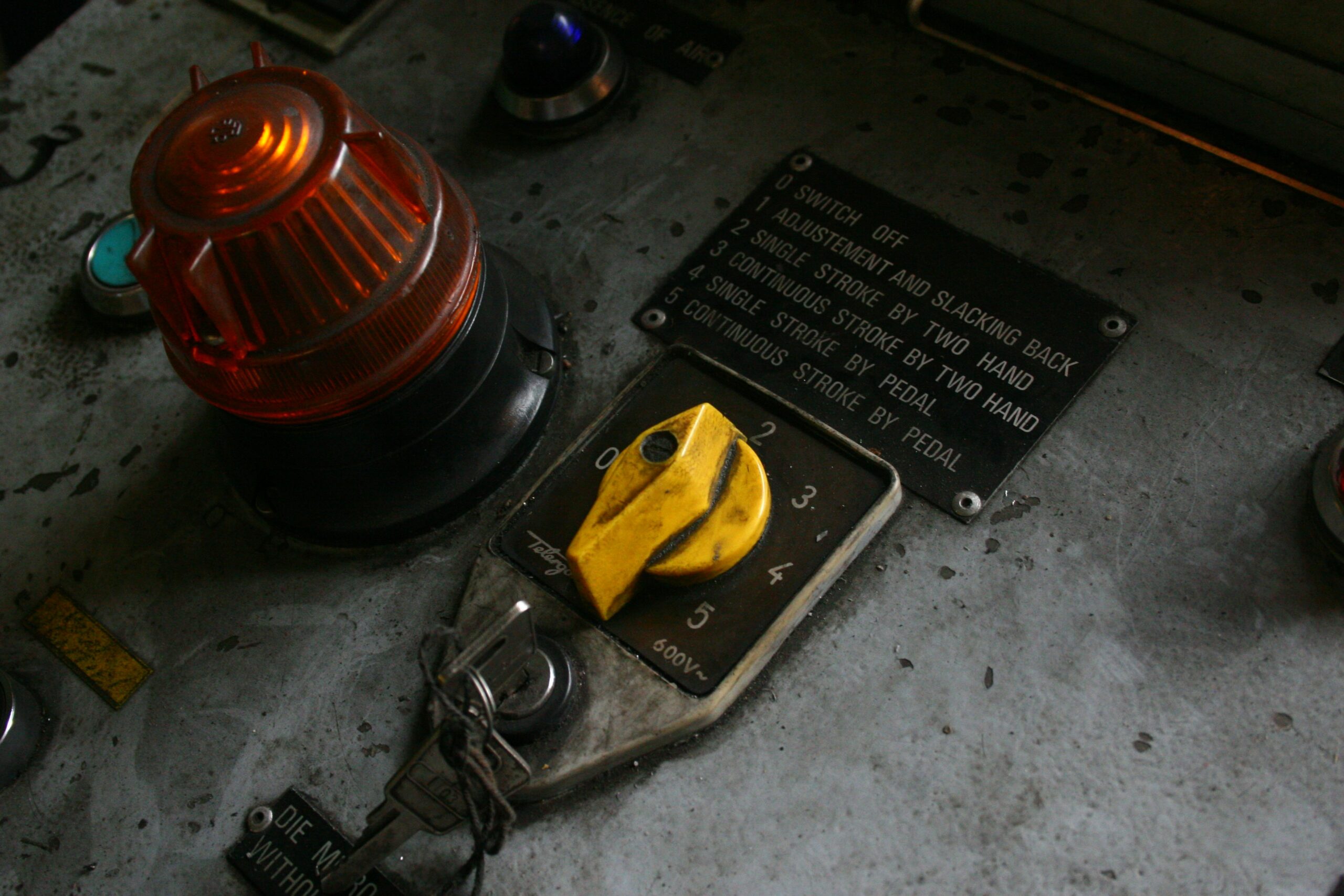 Industrial control panel with key switch representing operational control in a SQL Server environment